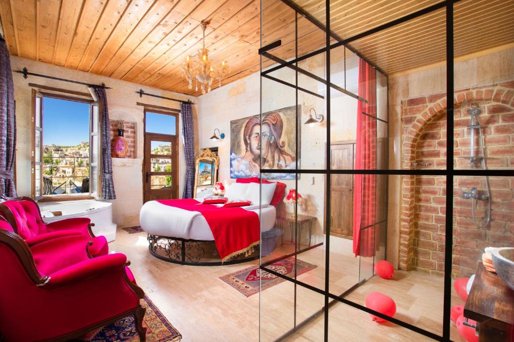 Postel nebo postele na pokoji v ubytování Carna Cave Hotel Cappadocia