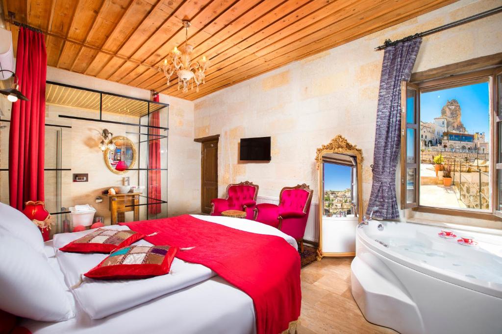 Postel nebo postele na pokoji v ubytování Carna Cave Hotel Cappadocia