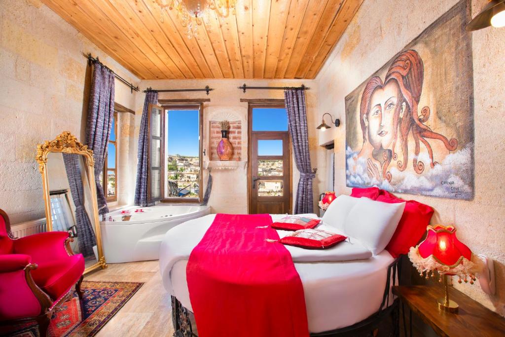 Postel nebo postele na pokoji v ubytování Carna Cave Hotel Cappadocia