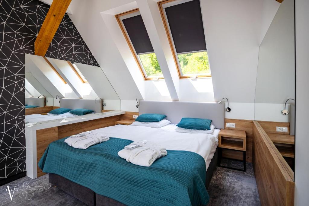 Postel nebo postele na pokoji v ubytování Hotel Limanova