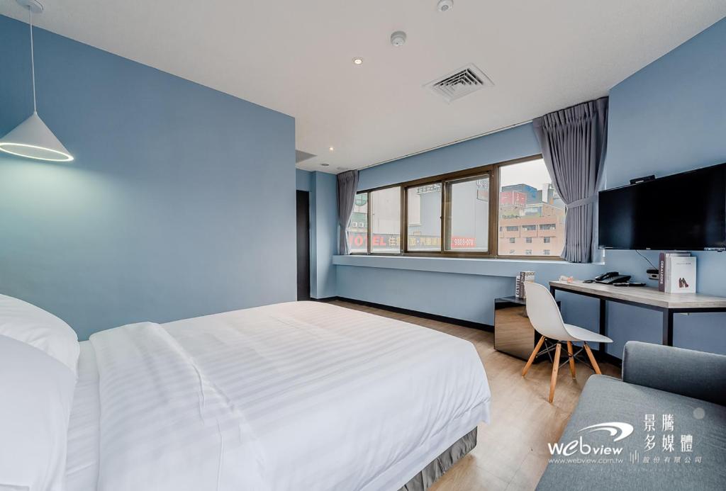 Postel nebo postele na pokoji v ubytování Prince Hotel