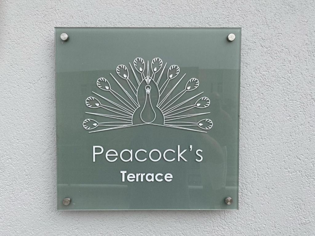 Certifikát, hodnocení, plakát nebo jiný dokument vystavený v ubytování Peacock's Apartments