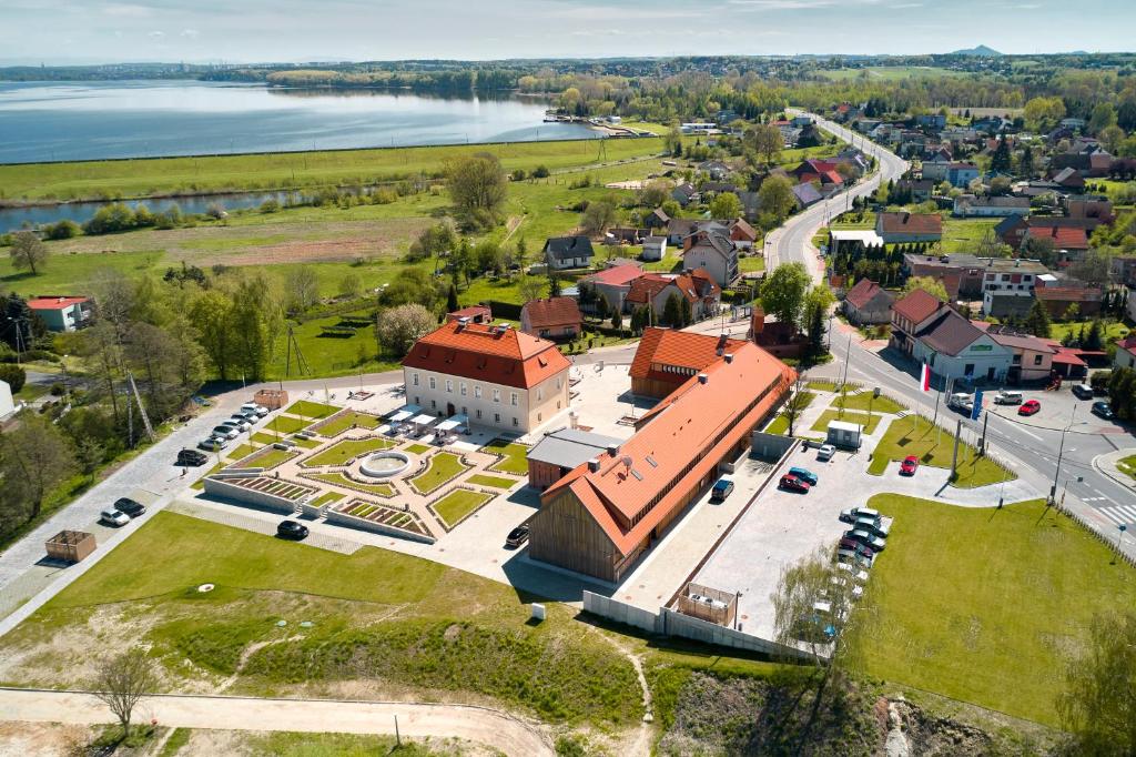 an aerial view of a building with a park at Bel Mon Resort in Rybnik