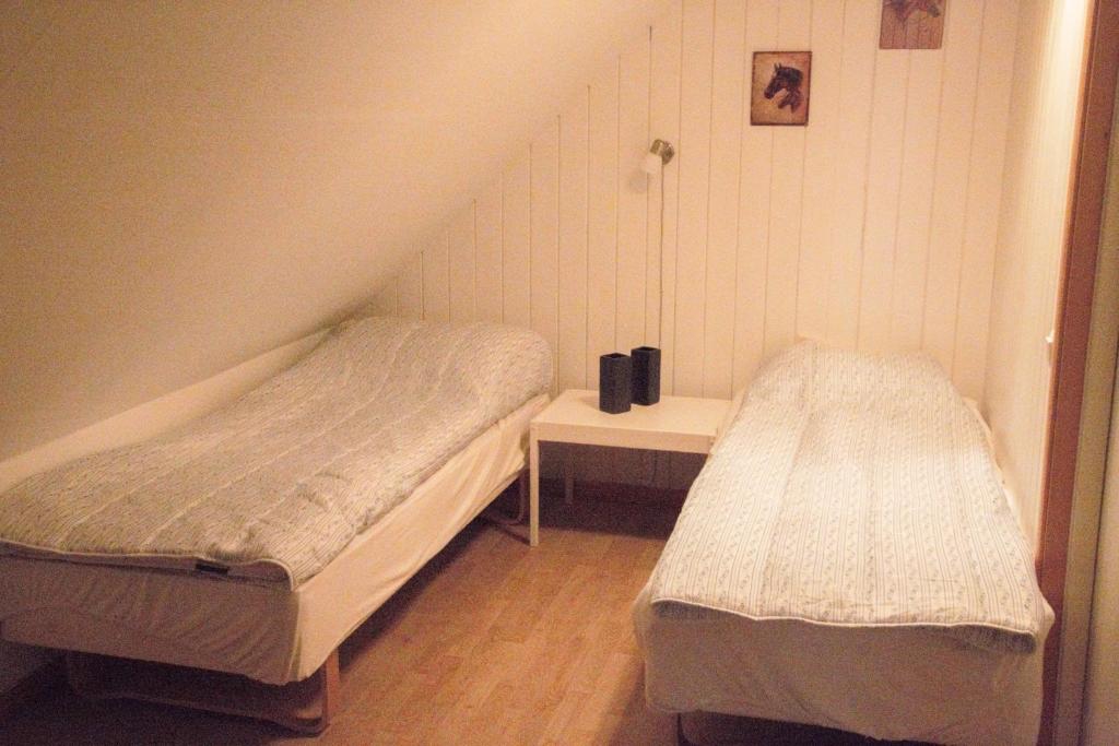 Postel nebo postele na pokoji v ubytování Ängagården - Gårdshuset