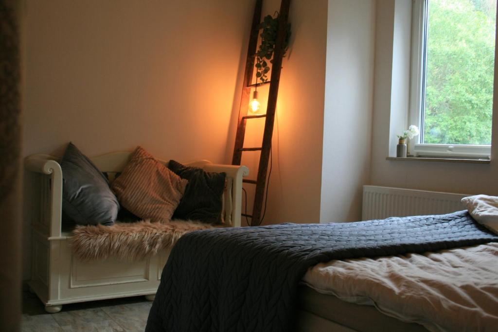 Postel nebo postele na pokoji v ubytování Familienpension Obere Juchhe, Ferienwohnung und Zimmer