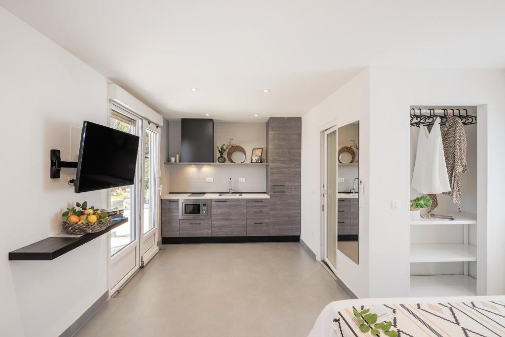 A cozinha ou cozinha compacta de Waterman Beach Village