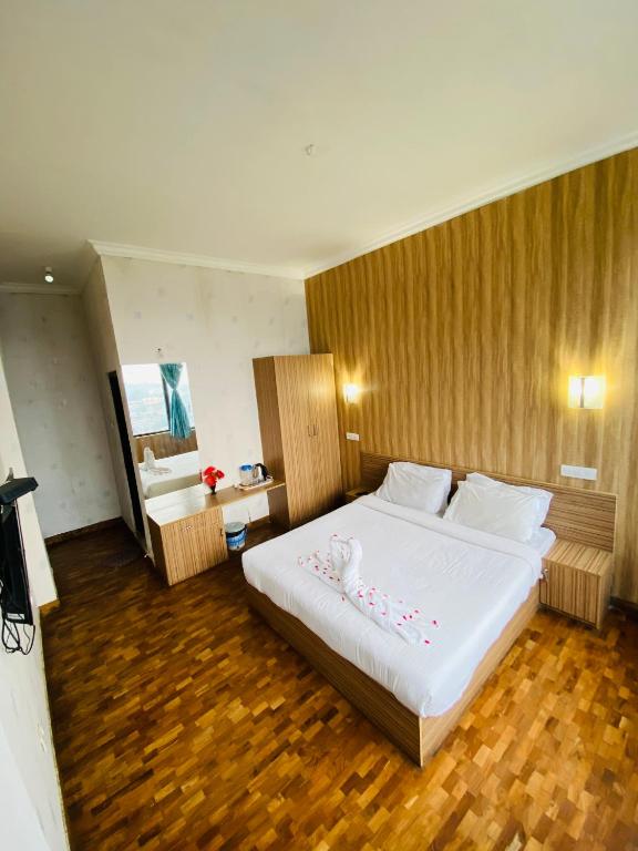 Postel nebo postele na pokoji v ubytování Tulips Resorts - Elkhill