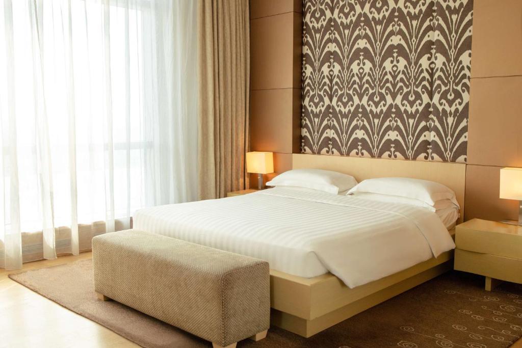 Postel nebo postele na pokoji v ubytování Hyatt Regency Dushanbe