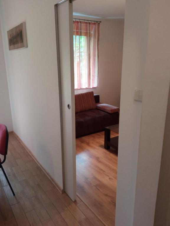 Łóżko lub łóżka w pokoju w obiekcie Belweder Apartamenty i Pokoje