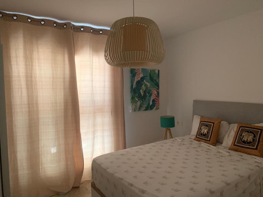 Posteľ alebo postele v izbe v ubytovaní Puerto Fino Apartamentos