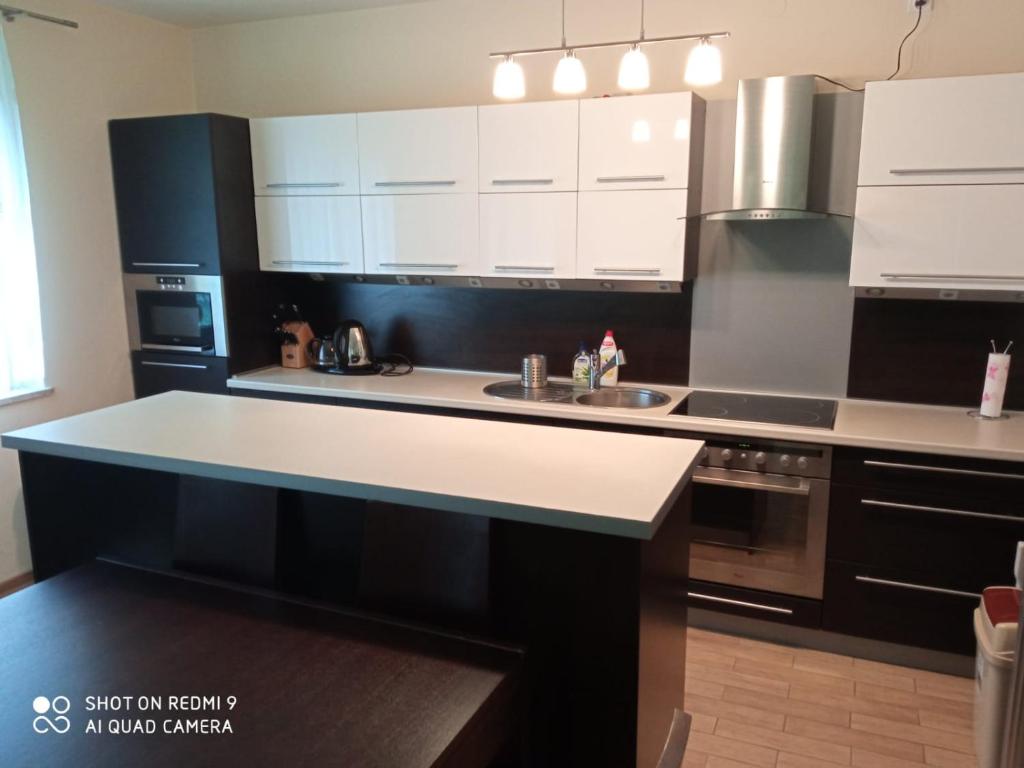 Kuchnia lub aneks kuchenny w obiekcie Belweder Apartamenty i Pokoje