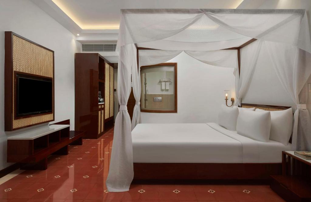 Postel nebo postele na pokoji v ubytování Radisson Blu Resort, Goa