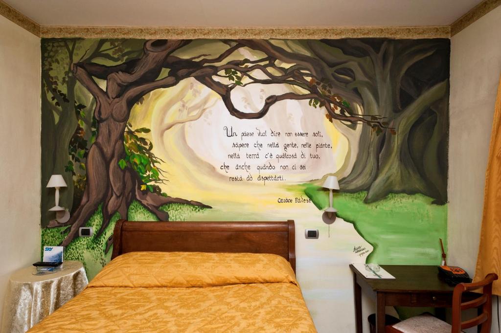 Postel nebo postele na pokoji v ubytování Albergo Antica Dogana