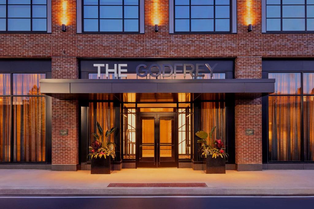 a building with a sign that reads the gherry at The Godfrey Detroit, Curio Collection By Hilton in Detroit