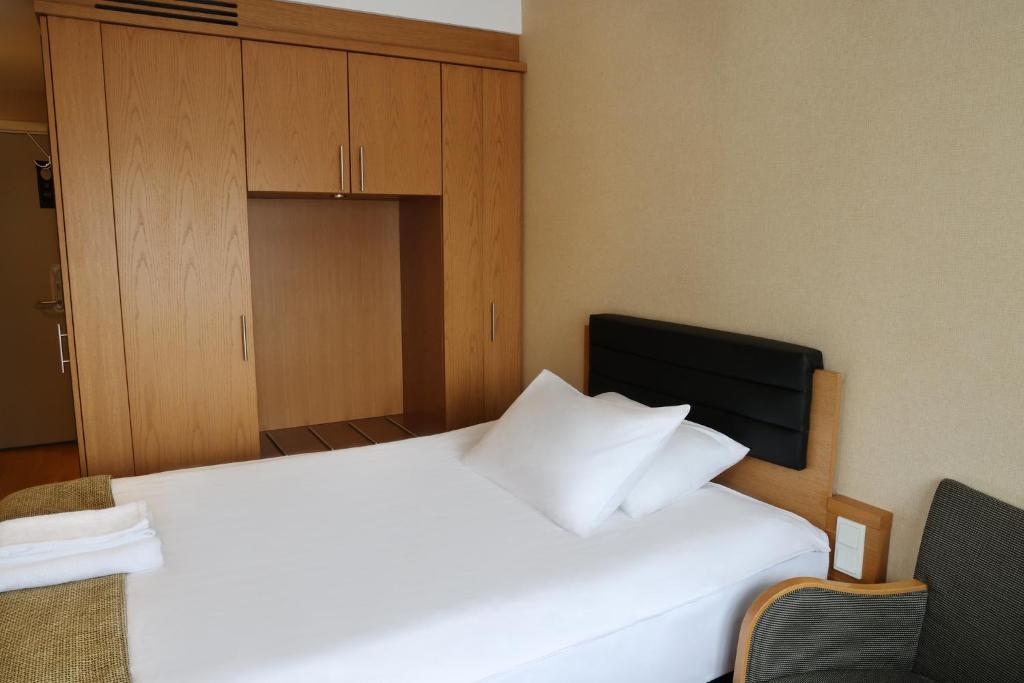 Postel nebo postele na pokoji v ubytování Hotel Reykjavík Centrum