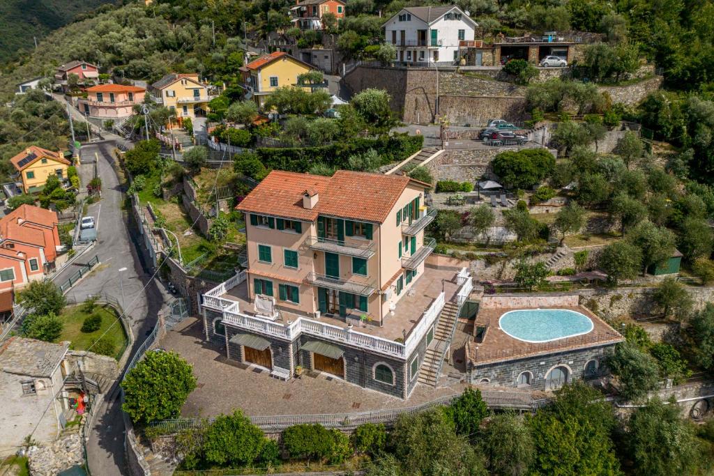 an aerial view of a house with a swimming pool at Belvedere, House With Pool- Recco, Liguria 