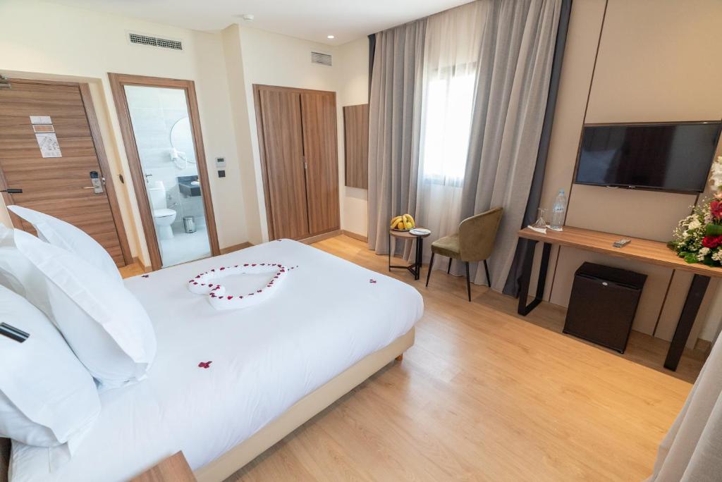 TV a/nebo společenská místnost v ubytování Imperial Boutique Hotel Rabat