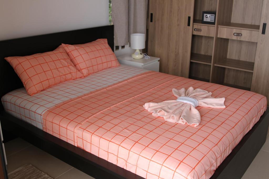 Postel nebo postele na pokoji v ubytování Belle Vue Lodge