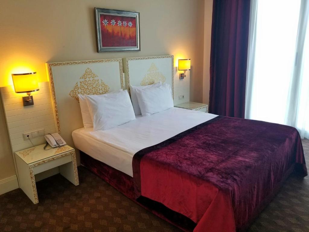 Postel nebo postele na pokoji v ubytování Crystal Admiral Resort Suites & Spa - Ultimate All Inclusive