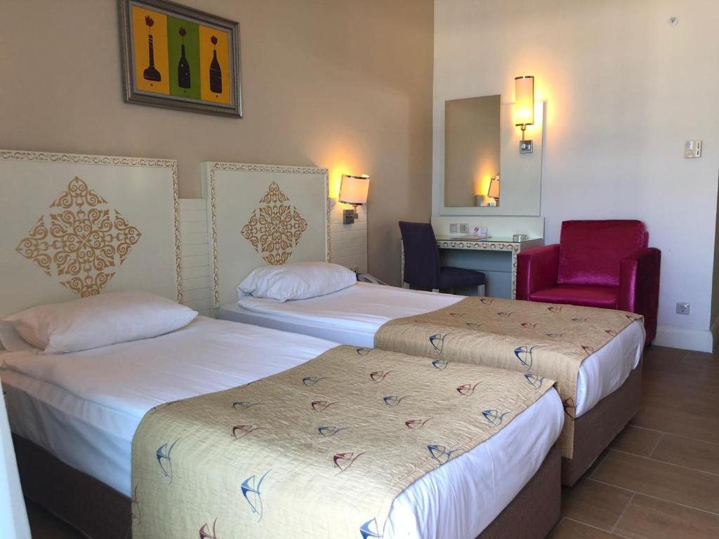 Postel nebo postele na pokoji v ubytování Crystal Admiral Resort Suites & Spa - Ultimate All Inclusive