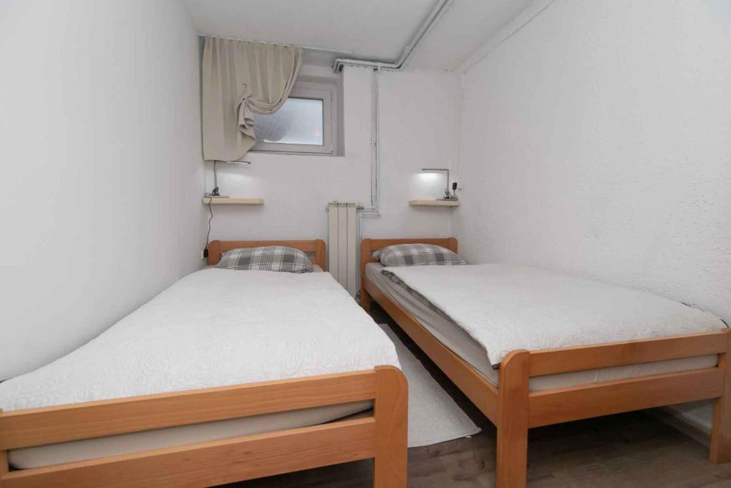 Llit o llits en una habitació de Apartment in Gomirje 27382