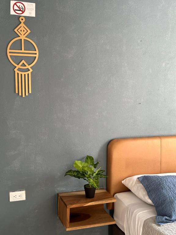 Postel nebo postele na pokoji v ubytování Hotel Casa Lucca