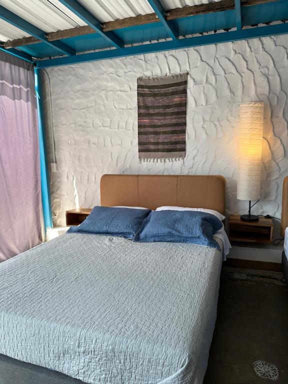 Postel nebo postele na pokoji v ubytování Hotel Casa Lucca