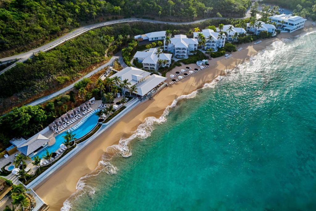 an aerial view of the beach at the resort at Morningstar Buoy Haus Beach Resort at Frenchman's Reef, Autograph Collection in St Thomas