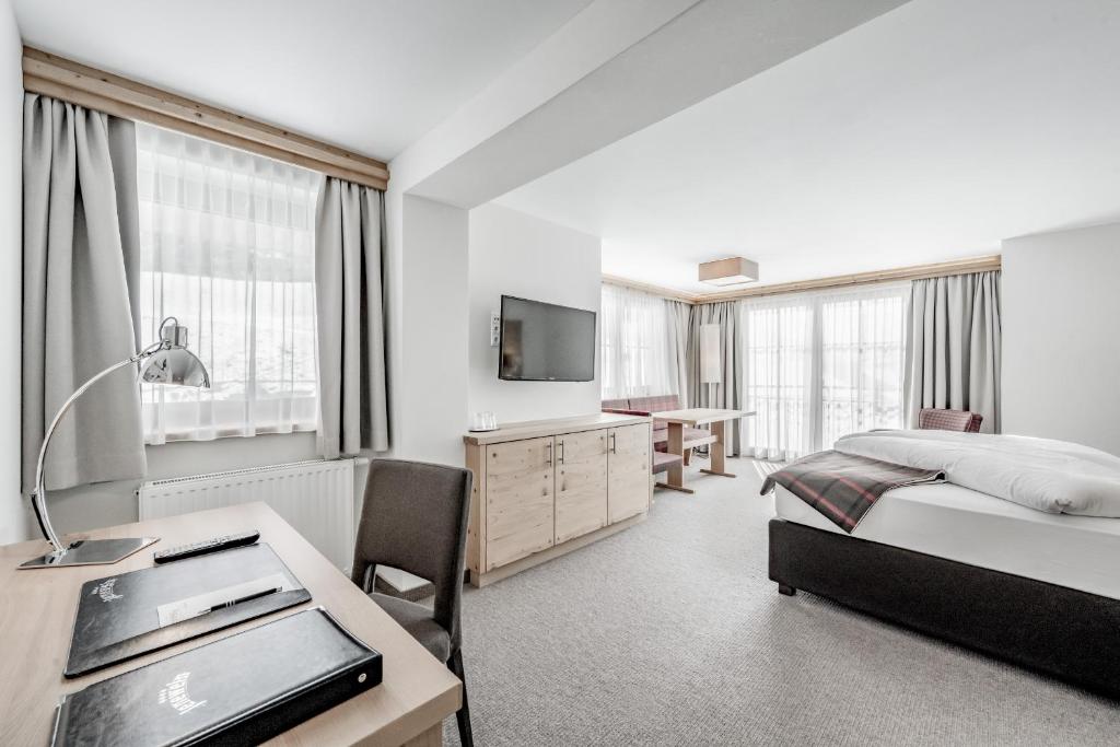 TV a/nebo společenská místnost v ubytování Hotel Jenewein