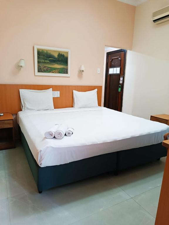 Postel nebo postele na pokoji v ubytování Hotel Atlântico Tower