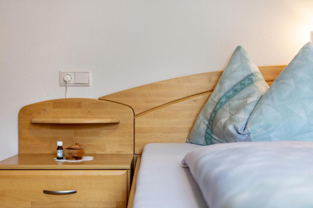 Postel nebo postele na pokoji v ubytování Obertegghof Wohnung Schartenblick