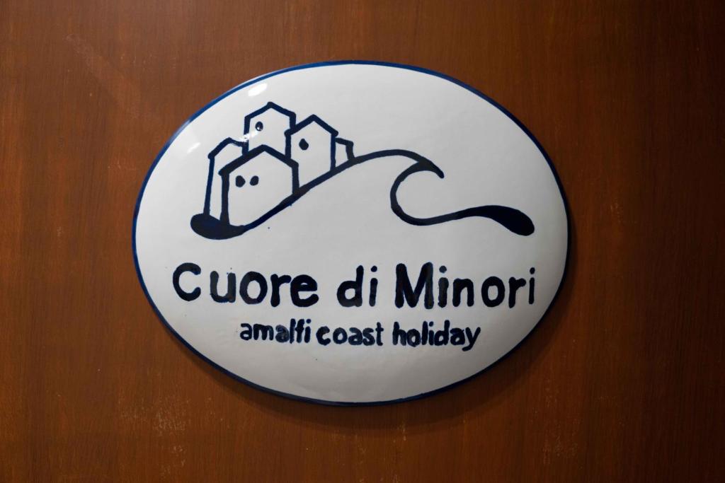 Certificato, attestato, insegna o altro documento esposto da Cuore di Minori