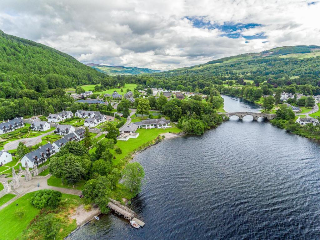 an aerial view of a small town on a river at The Kenmore Club in Kenmore