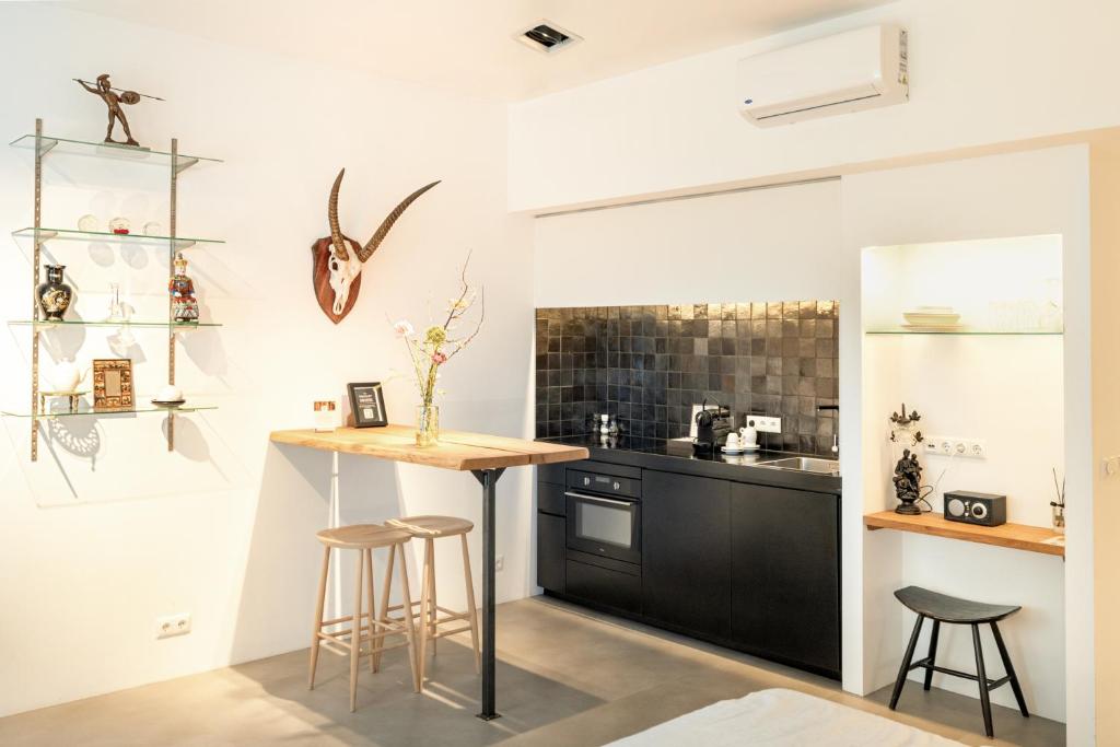 Kuchyň nebo kuchyňský kout v ubytování Boutique Hotel Goud En Zilver