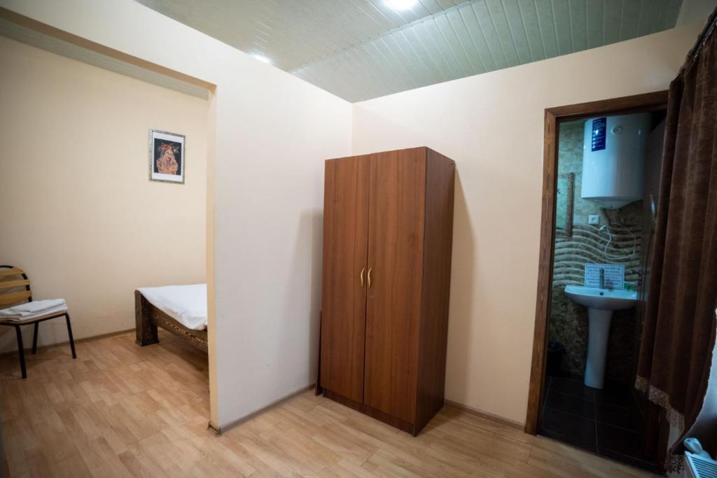Postel nebo postele na pokoji v ubytování Arevik Resort Cottages