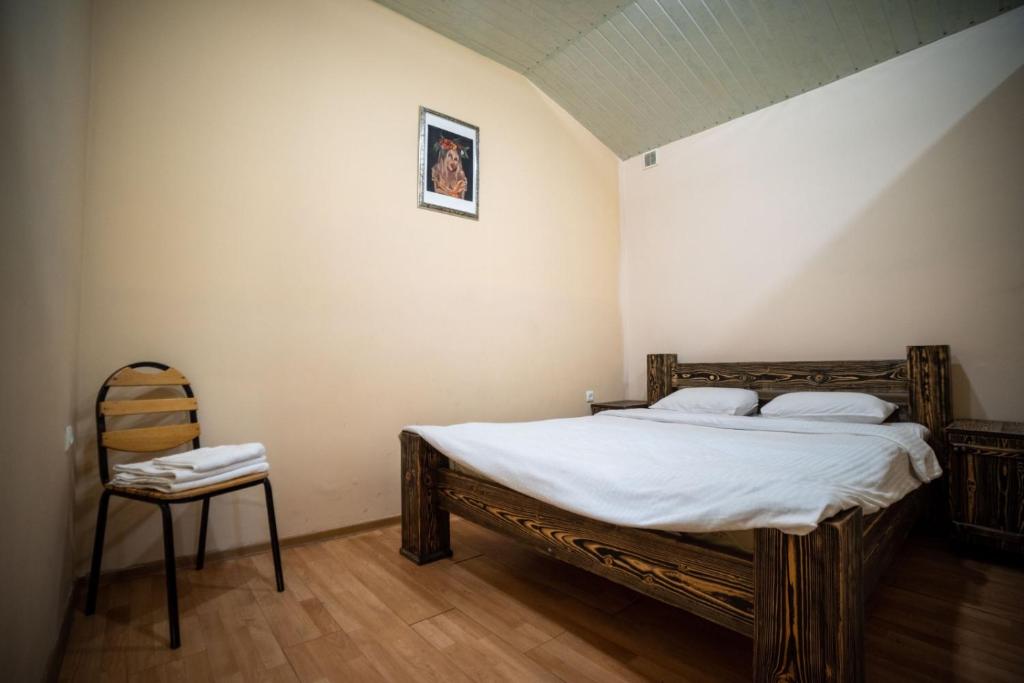 Postel nebo postele na pokoji v ubytování Arevik Resort Cottages