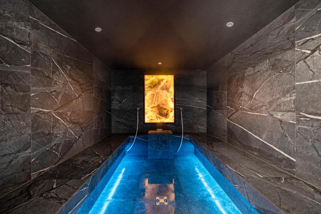 Kolam renang di atau dekat dengan Thermal-Badhotel Kirchler