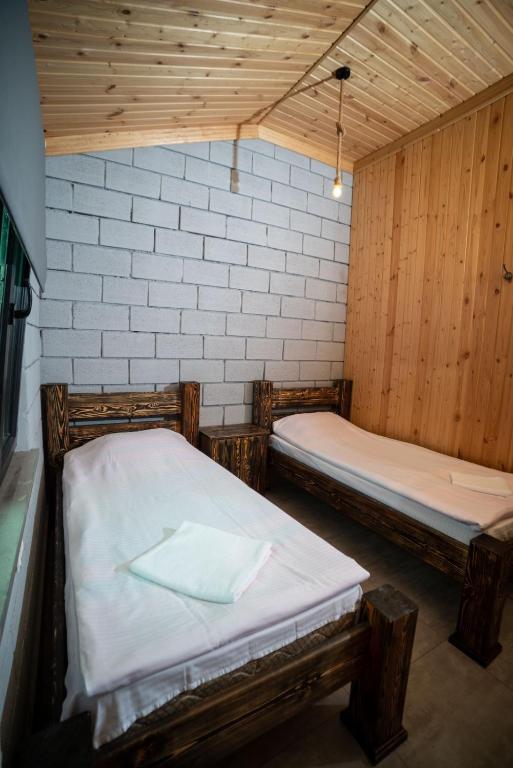 Postel nebo postele na pokoji v ubytování Arevik Resort Cottages