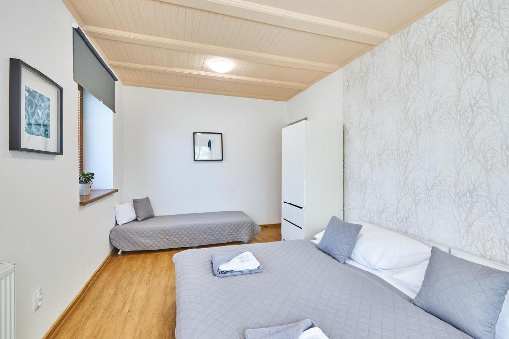 Postel nebo postele na pokoji v ubytování Villa Gap apartments