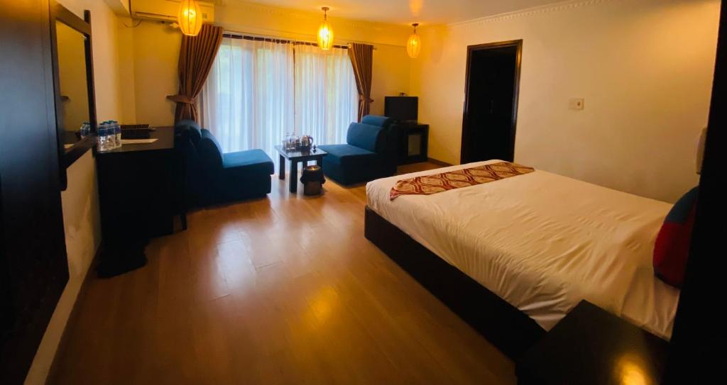 Postel nebo postele na pokoji v ubytování Sapa Elite Hotel