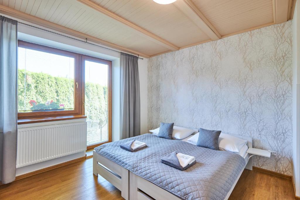 Postel nebo postele na pokoji v ubytování Villa Gap apartments