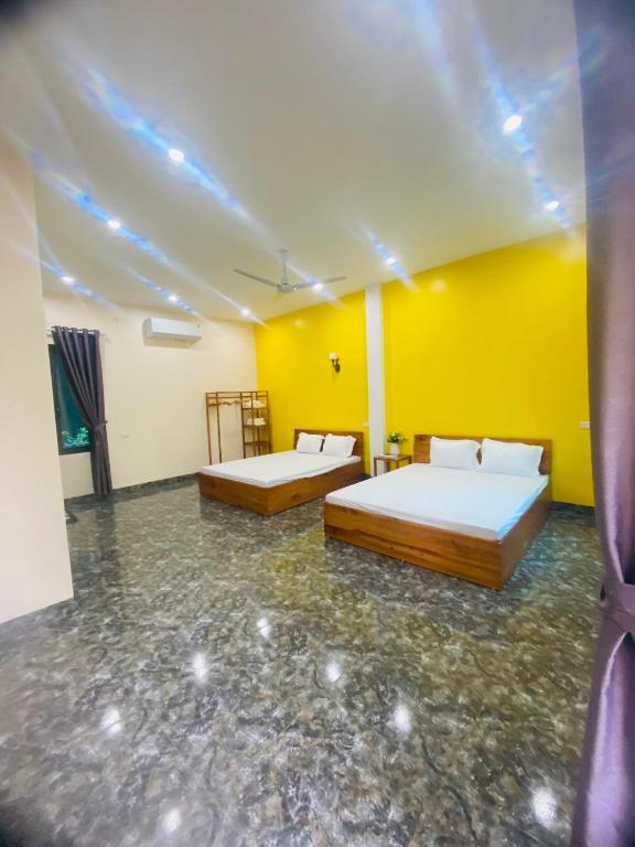 Postel nebo postele na pokoji v ubytování Homestay Bài Văn garden