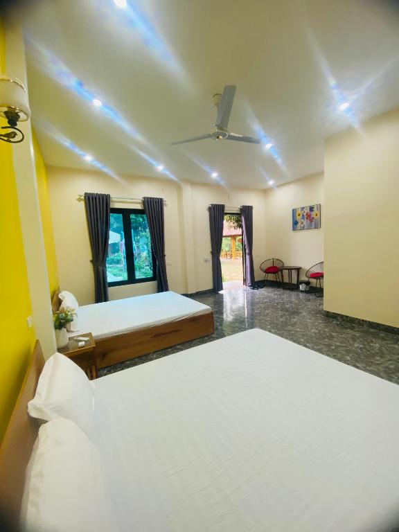 Postel nebo postele na pokoji v ubytování Homestay Bài Văn garden