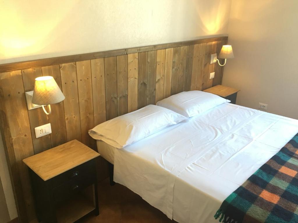 Postel nebo postele na pokoji v ubytování 5 Terre Express