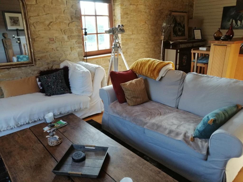 Posezení v ubytování Le Gite Du Breux Face Semois Chassepierre au 2 ème étage