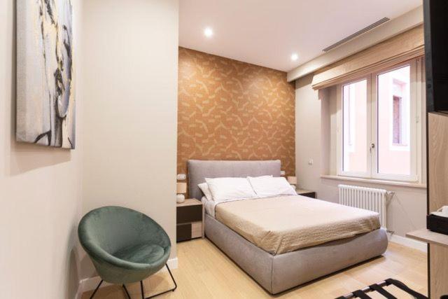 Postel nebo postele na pokoji v ubytování Casa Ilaria
