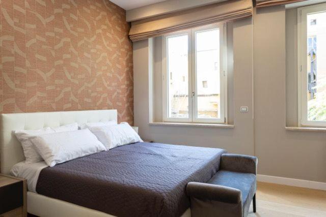 Postel nebo postele na pokoji v ubytování Casa Ilaria