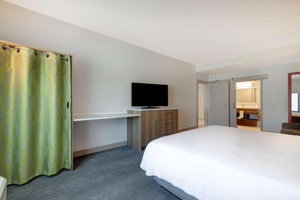 TV a/nebo společenská místnost v ubytování Home2 Suites By Hilton Las Vegas Northwest