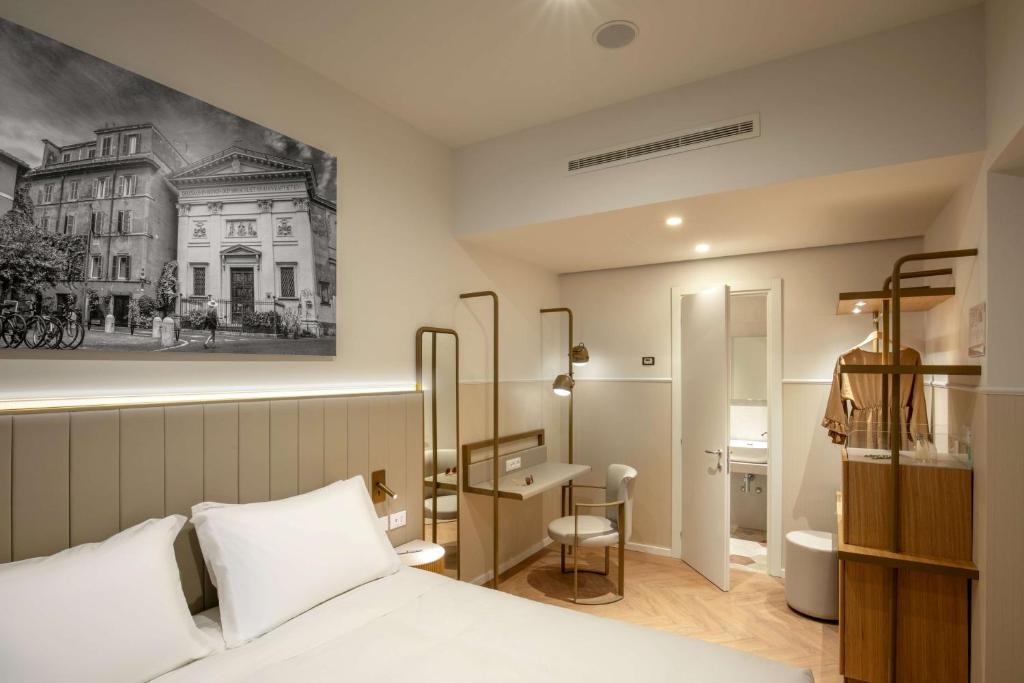 Postel nebo postele na pokoji v ubytování Cosmopolita Hotel Rome, Tapestry Collection by Hilton