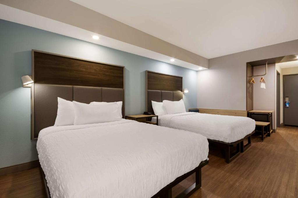 Postel nebo postele na pokoji v ubytování Tru By Hilton Destin